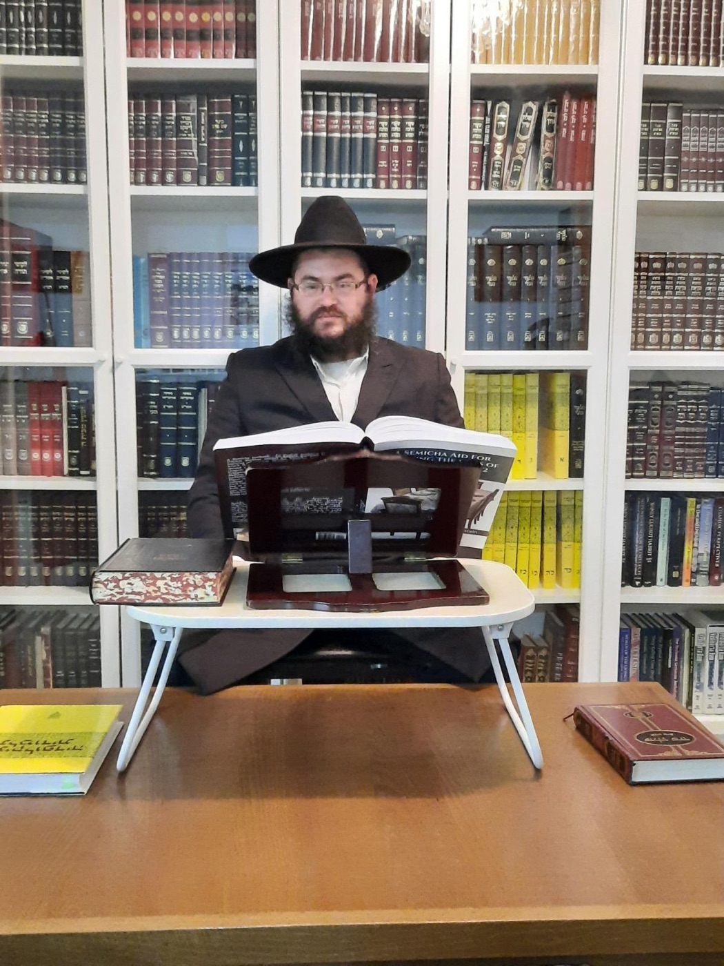 Rabbi Yaakov Goldstein learning at his shtender